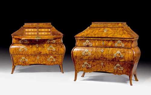 PAIR OF BUREAUS,Baroque, Lombardei circa 1740. Walnut and burlwood veneer also inlaid with reserves. Bombé form on all sides with salient front angles, fall front writing surface over richly shaped lower section with 3 drawers, the lower drawers broader and sans traverse. With fitted interior. Bronze mounts and partly replaced wooden knobs. 117x56x(open 88)x117 cm. Provenance: aristocratic collection, Tessin. A rare high quality pair