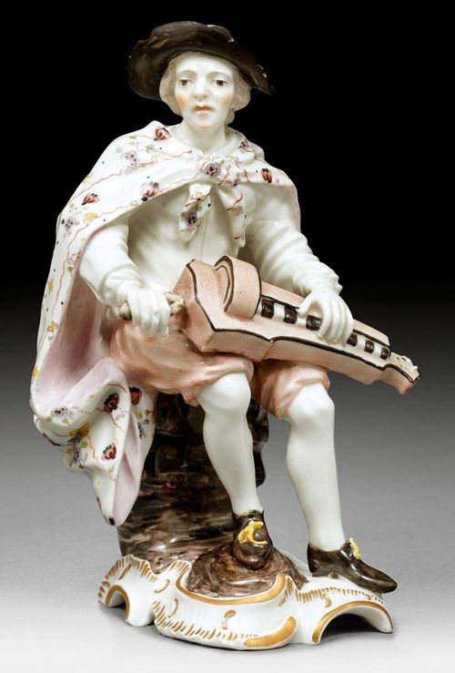 HURDY GURDY PLAYER, Frankenthal, Joseph Adam Hannong circa 1759-62.Model by Johann Wilhelm Lanz. Lion rampant and ligature JAH monogram for Joseph Adam Hannong in underglaze blue, H, AF and 2 incised. H 15cm. Minor chips. Provenance: - Sotheby's London, 24 February 1978, Lot 58. - Swiss private collection.