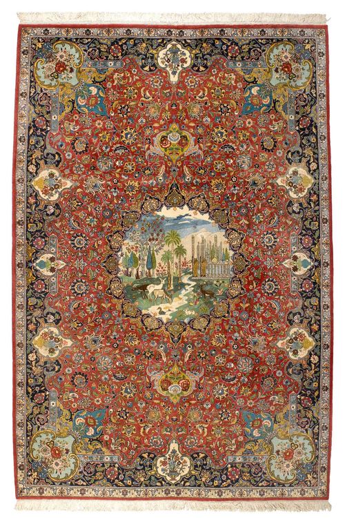 ISFAHAN old.Red central field with trailing flowers and palmettes, the central medallion is decorated with a landscape, blue border with trailing flowers, good condition, 190x290 cm.