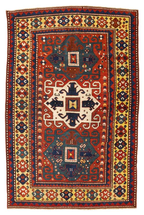 KAZAK antique.Red central field with three medallions in green and white, geometrically patterned, yellow border, good condition, 140x215 cm.