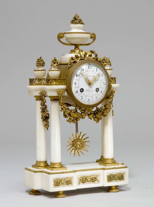 PORTAL CLOCK, late Napoléon III, France, the dial signed BLANCHON A PARIS. White marble and bronze. Cylindrical case with 4 pillars and a stepped base, the top decorated with a vase. White enamelled dial. Parisian movement striking the ½-hour on bell. 23x10x39 cm. Provenance: Gut Aabach, Risch am Zugersee.