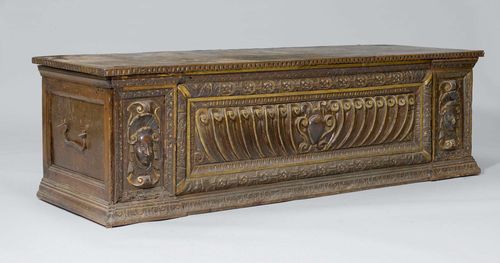 CARVED CHEST, Renaissance and later, Italy. Walnut and pine carved and painted. Iron lock and handles. 168x50x47 cm. Parts of the lid and interior as well as rear panel later.