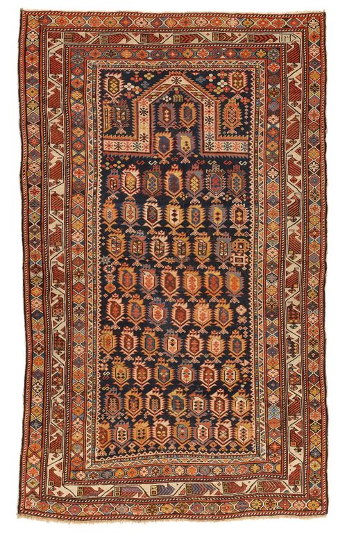 SHIRVAN MARASALI antique.Dark blue mihrab finely patterned with boteh motifs, wide colourful border, evenly worn, 115x195 cm.
