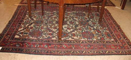 ARMENIAN RUG old.White ground with stylised flowers. Red border. Slight wear, 200x155 cm.