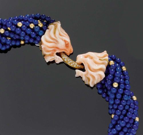 LAPIS-LAZULI CORAL AND DIAMOND TORSADE. Yellow gold 750. Fancy twelve-row necklace/torsade of numerous lapis-lazuli and gold beads of ca. 4 mm Ø. The fastener of 2 cut, light pink corals in the shape of a lion head, in between a ring motif decorated with 19 brilliant-cut diamonds totalling ca. 0.20 ct. L ca. 43 cm.