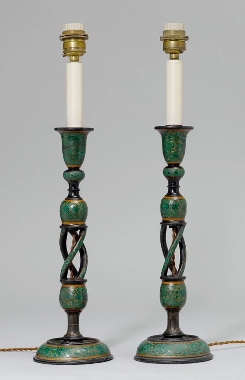 PAIR OF SMALL LAMPS, 19th century. Carved wood, painted green/gold. Open-worked shaft with 3 curved bars. Vase-shaped nozzle and round foot. H 55.5 cm. Fitted for electricity.