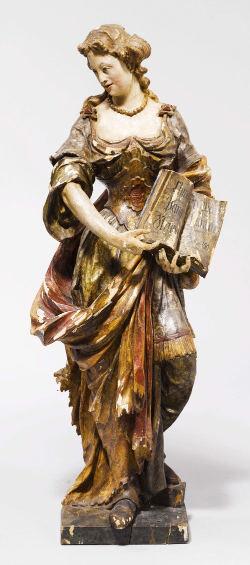 FEMALE FIGURE,Southern Germany, 1st half of the 18th century. Wood carved, verso flattened and painted. H 94 cm. Provenance: Gut Aabach, Risch am Zugersee.