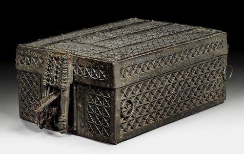 CASKET, known as a "Messebuchkästchen",Renaissance, probably France or Spain, 15th/16th century. Finely pierced iron plaques on wood. The rectangular casket with double lock and gothic architectural motifs. Lined inside with old paper. 33x23x14 cm. Provenance: Swiss private collection. Fine casket in almost untouched condition. Two almost identical caskets were sold in Koller June auction 2004 (lot 1001) and December auction 2006 (lot 1019)